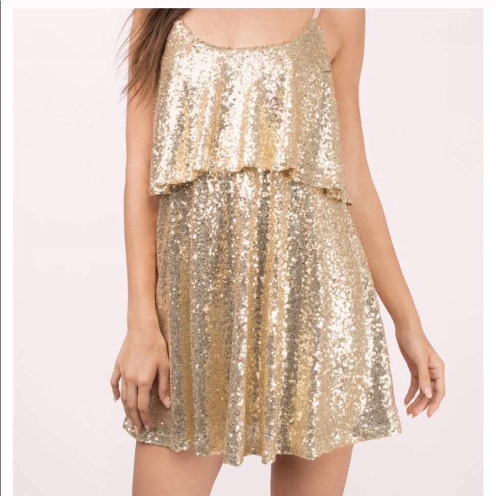 Beautiful gold sequin skater dress.